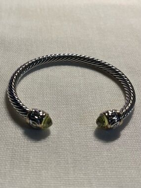 John Madeiras cuff bracket with peridot end stones